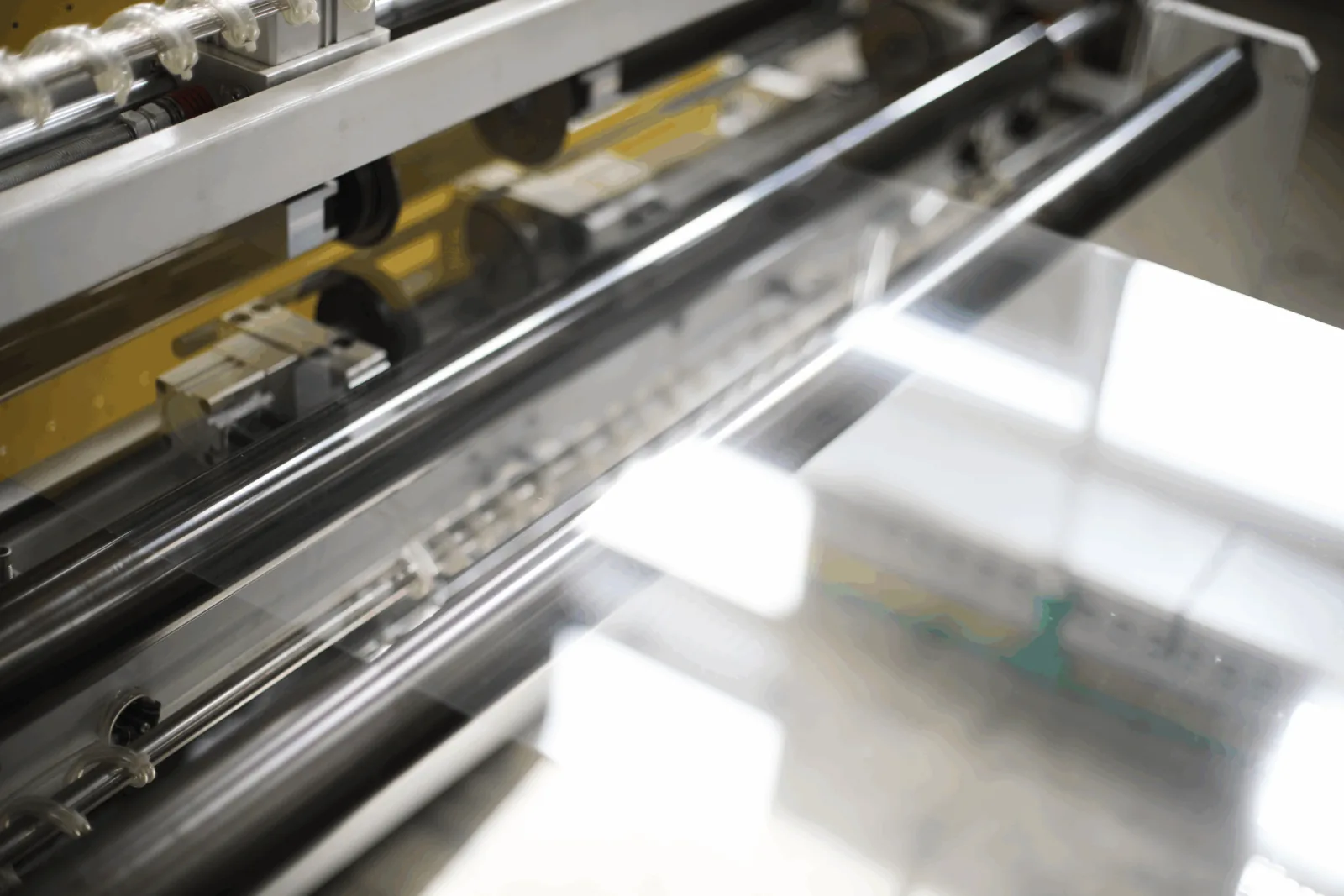 Polished rollers guiding PET sheet through the line