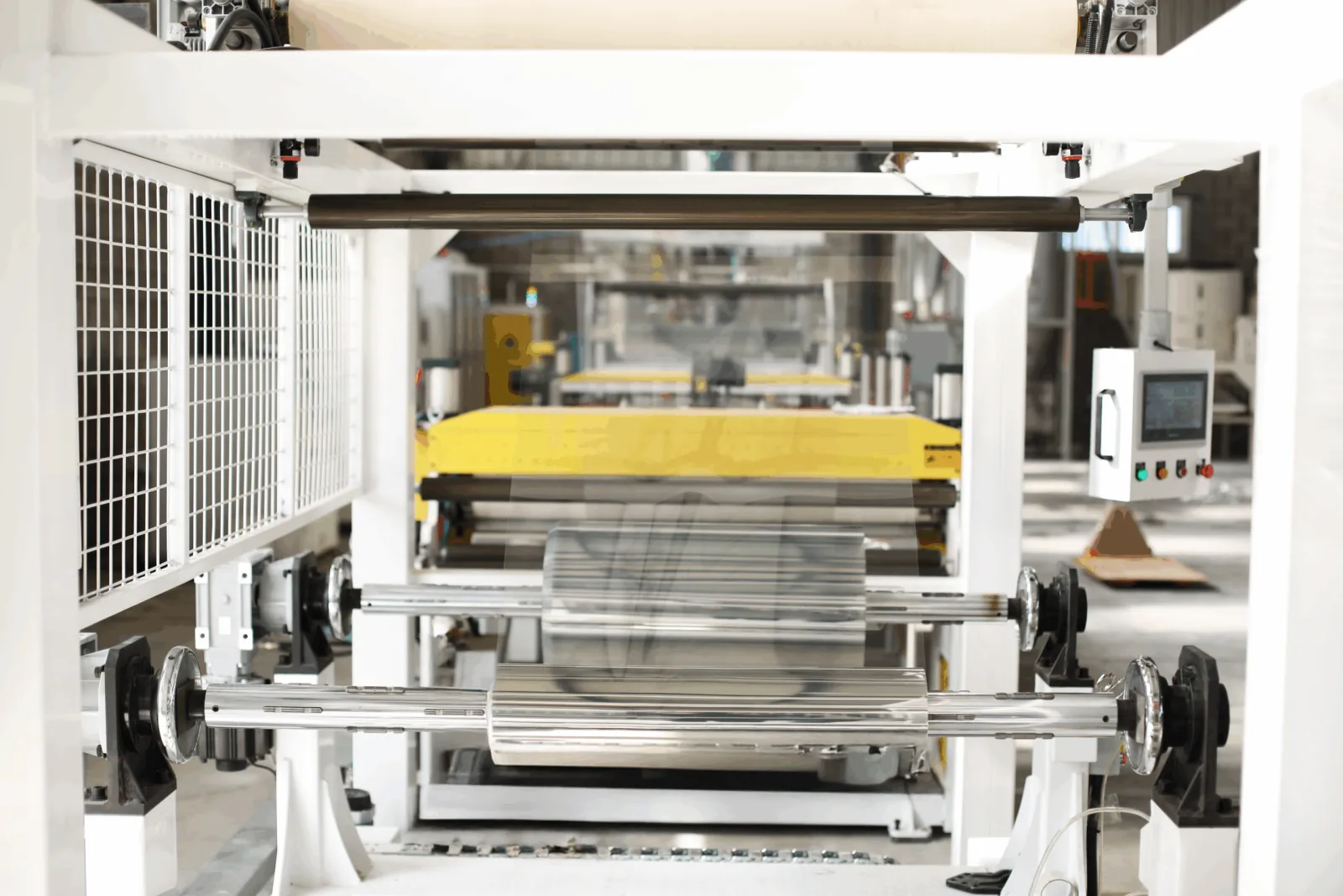Guarded winding station with PET film on the machine